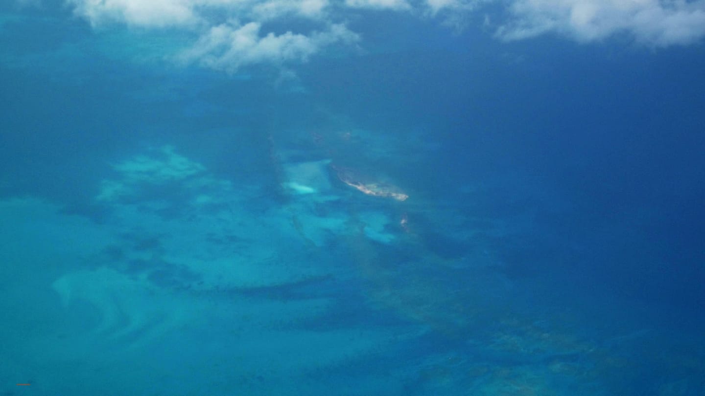 Low Exuma islands and bright turquoise banks seen from above