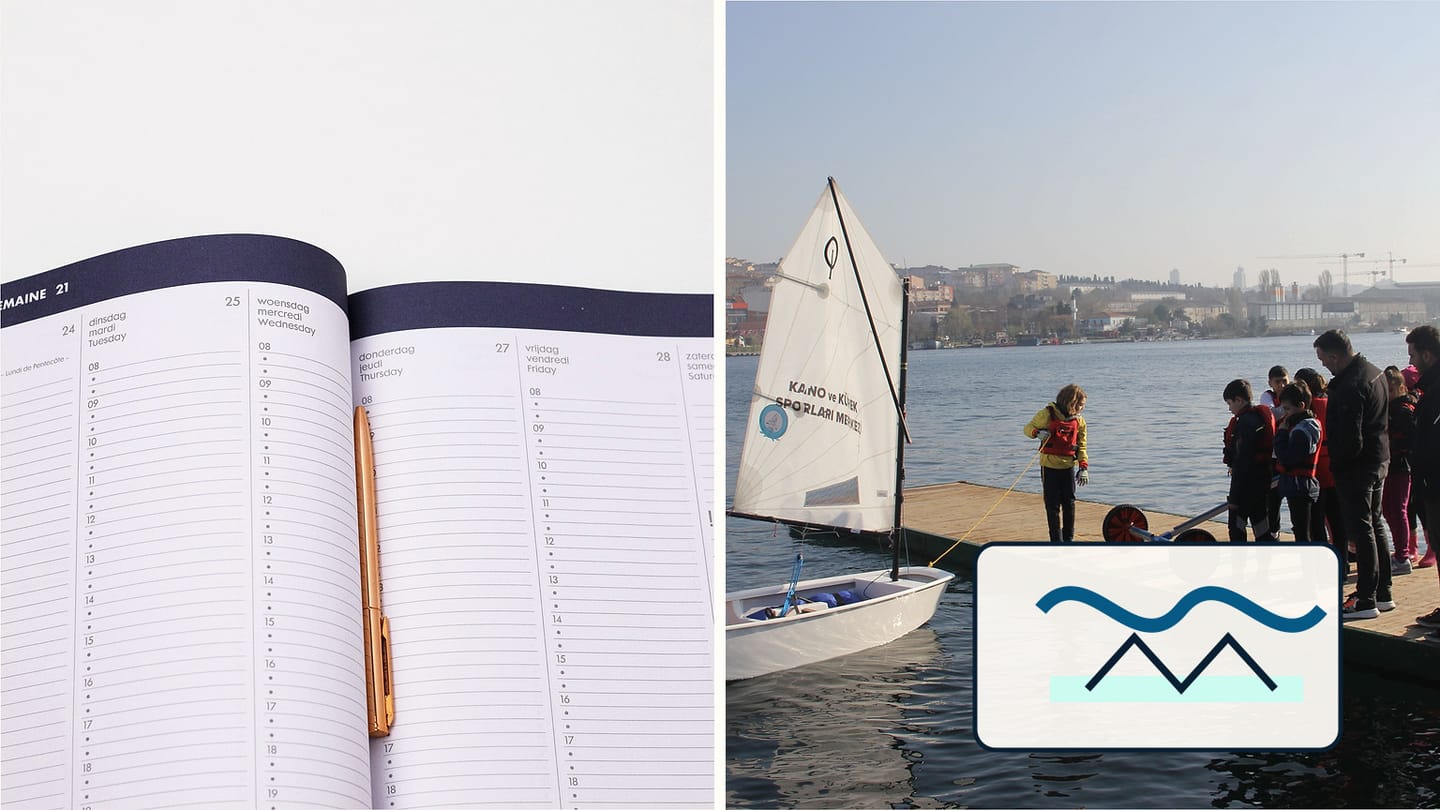 An open planner beside a dockside dinghy class and a coastal-location symbol