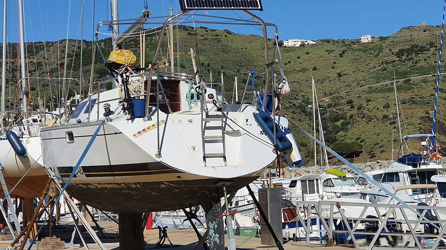 Solar panels mounted above a sailboat deck