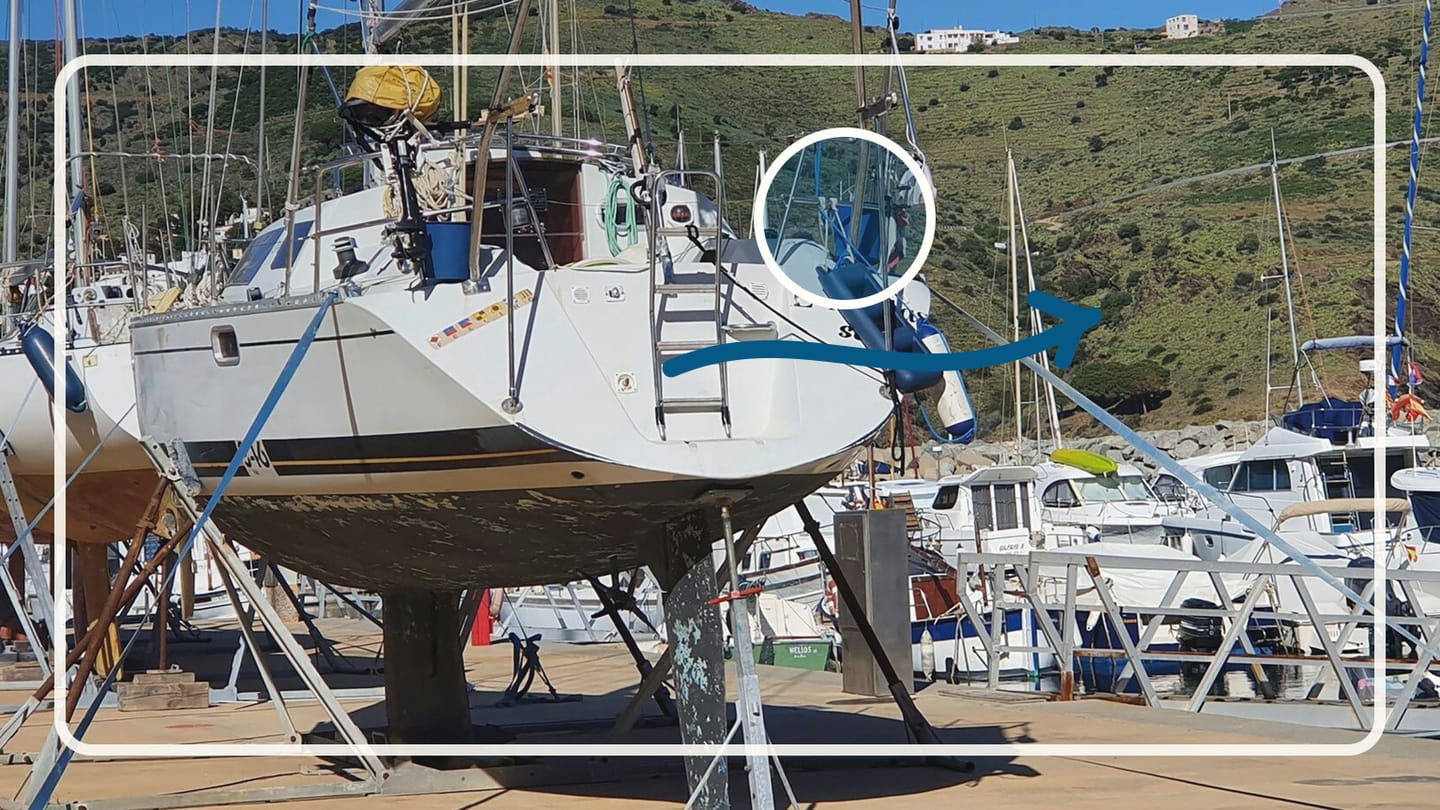 Sailboat resting on supports in a boatyard