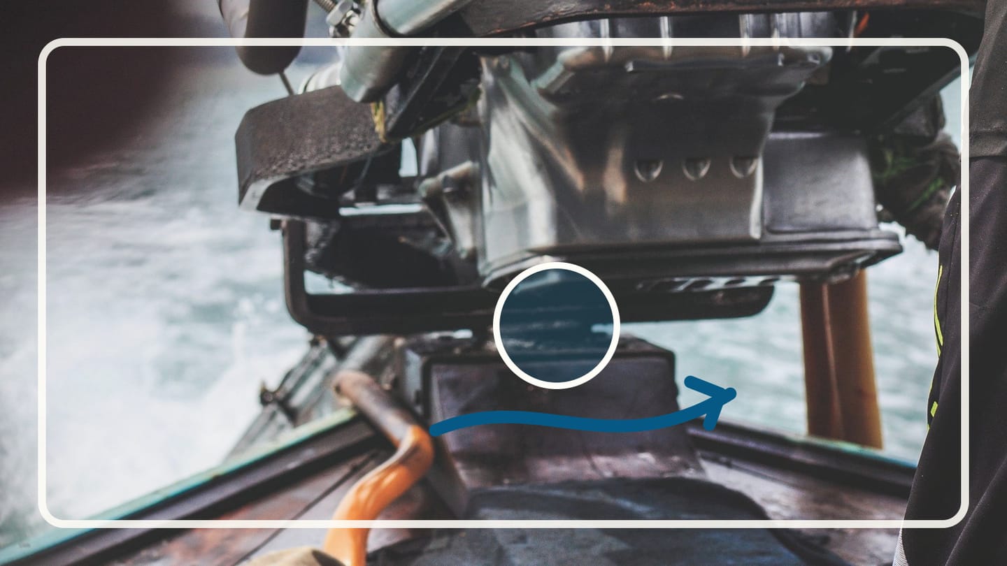 Hoses, clamps, and exhaust components in a crowded marine engine bay