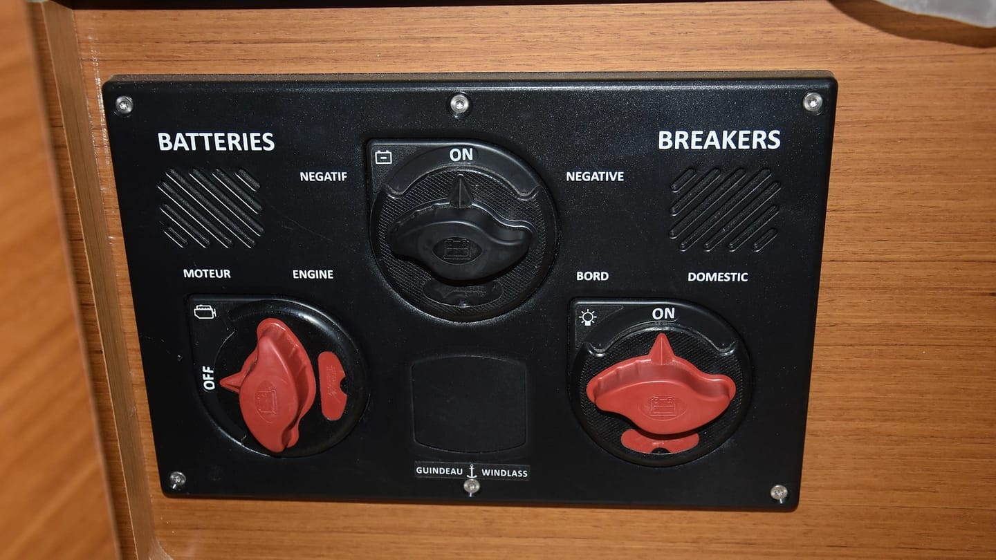 Engine and domestic battery selector switches mounted aboard a sailboat