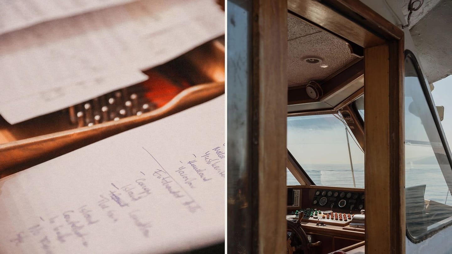 Handwritten checklist beside a wooden yacht helm console