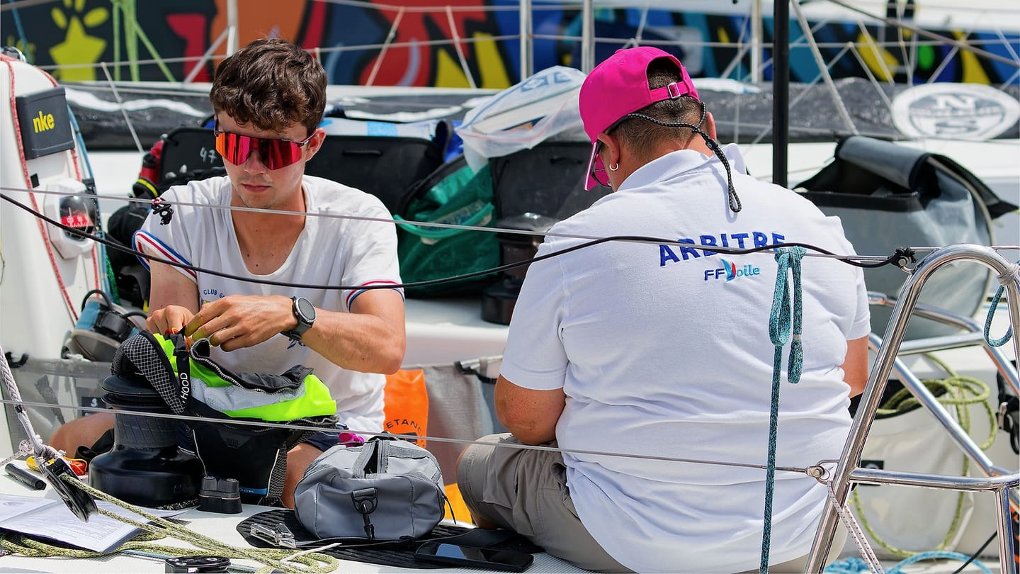 Crew inspecting a charter sailboat before accepting risk