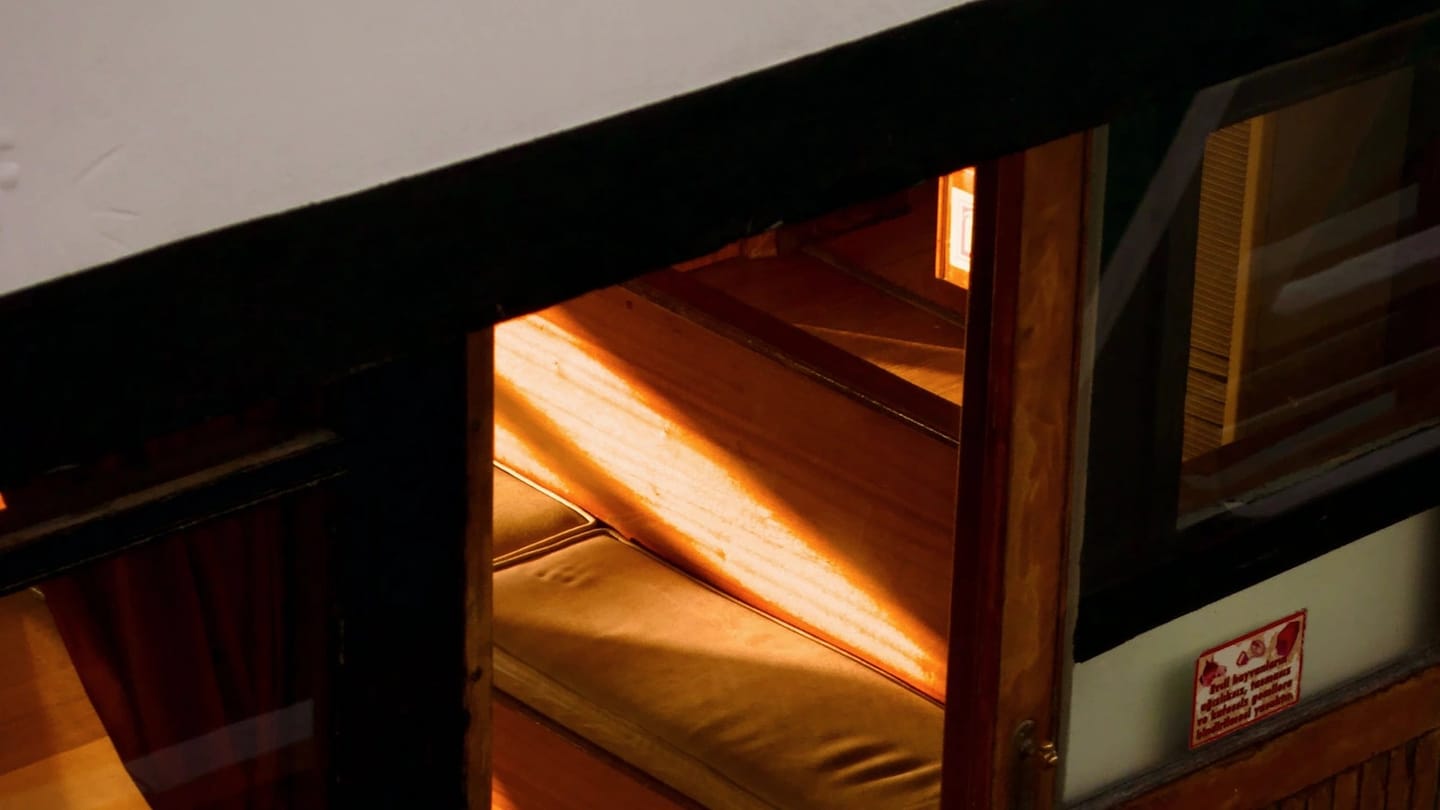 Wooden boat cabin lit by sunlight