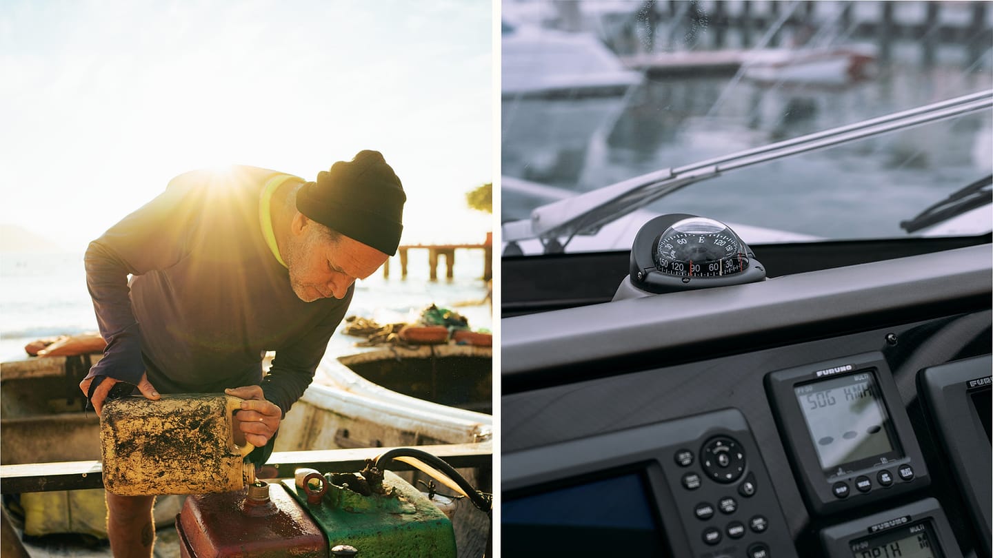 Mechanic beside a yacht and a small service boat