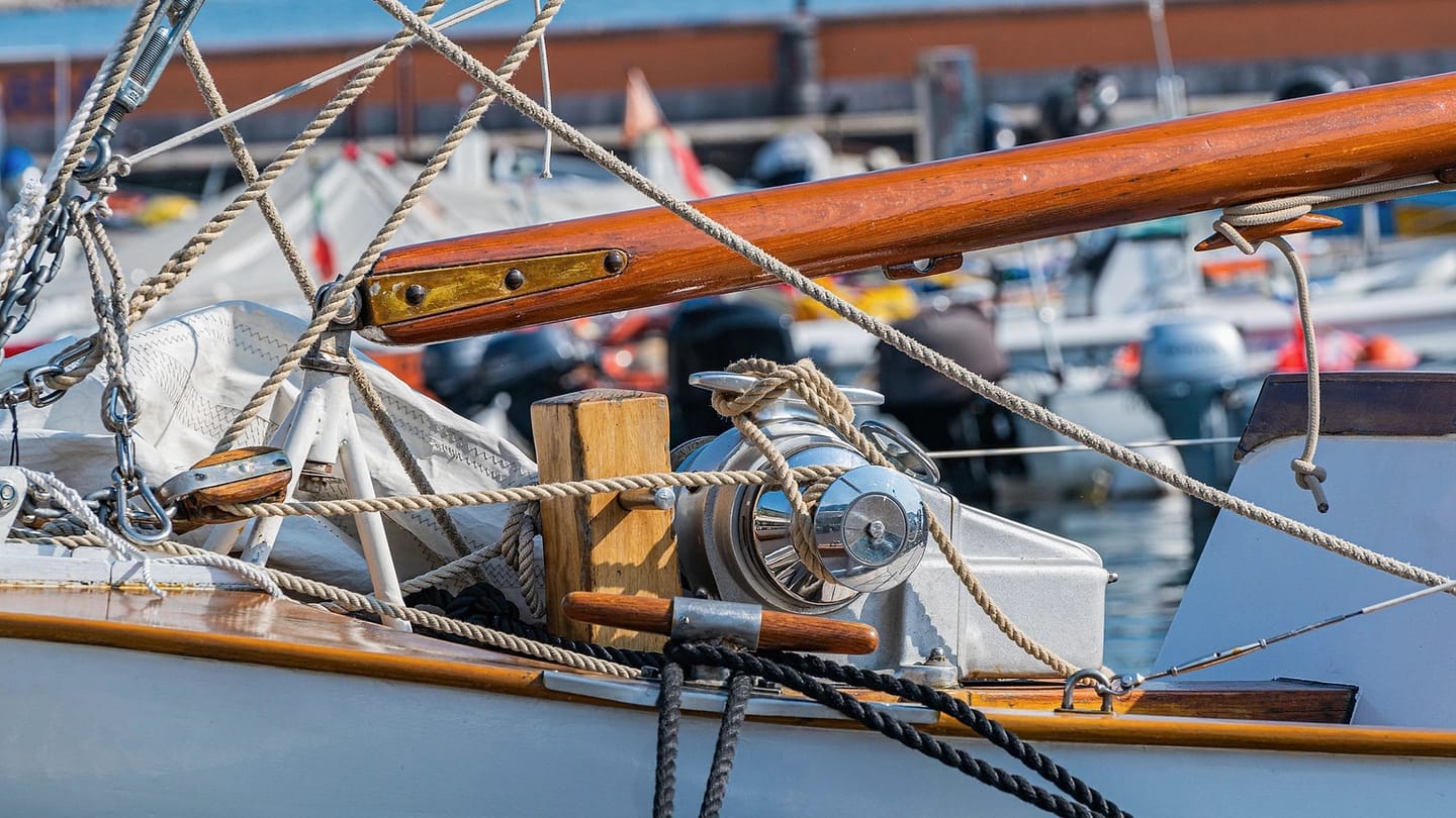Sailboat ropes and deck fittings at a marina