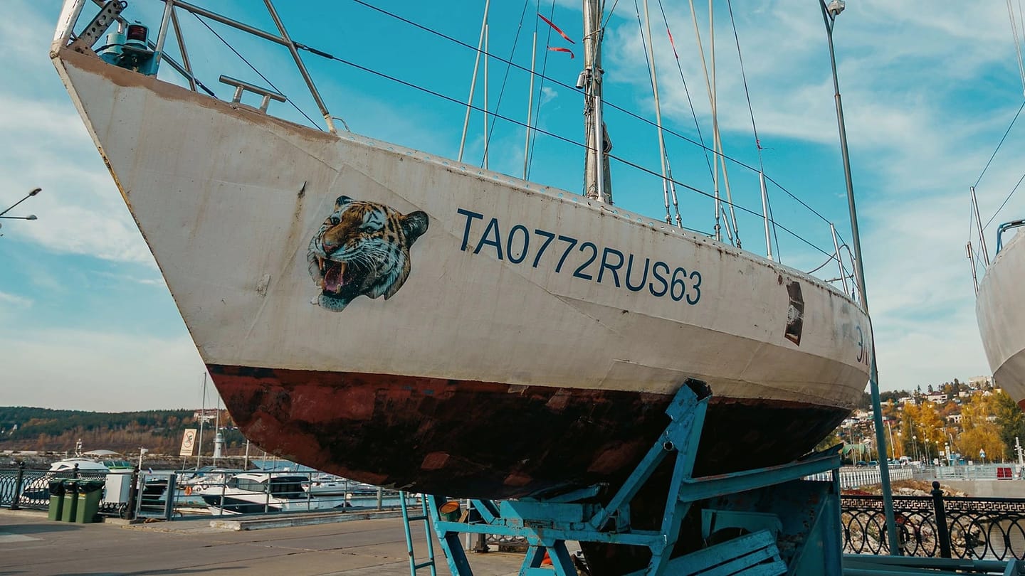 Sailboat standing ashore in a boatyard