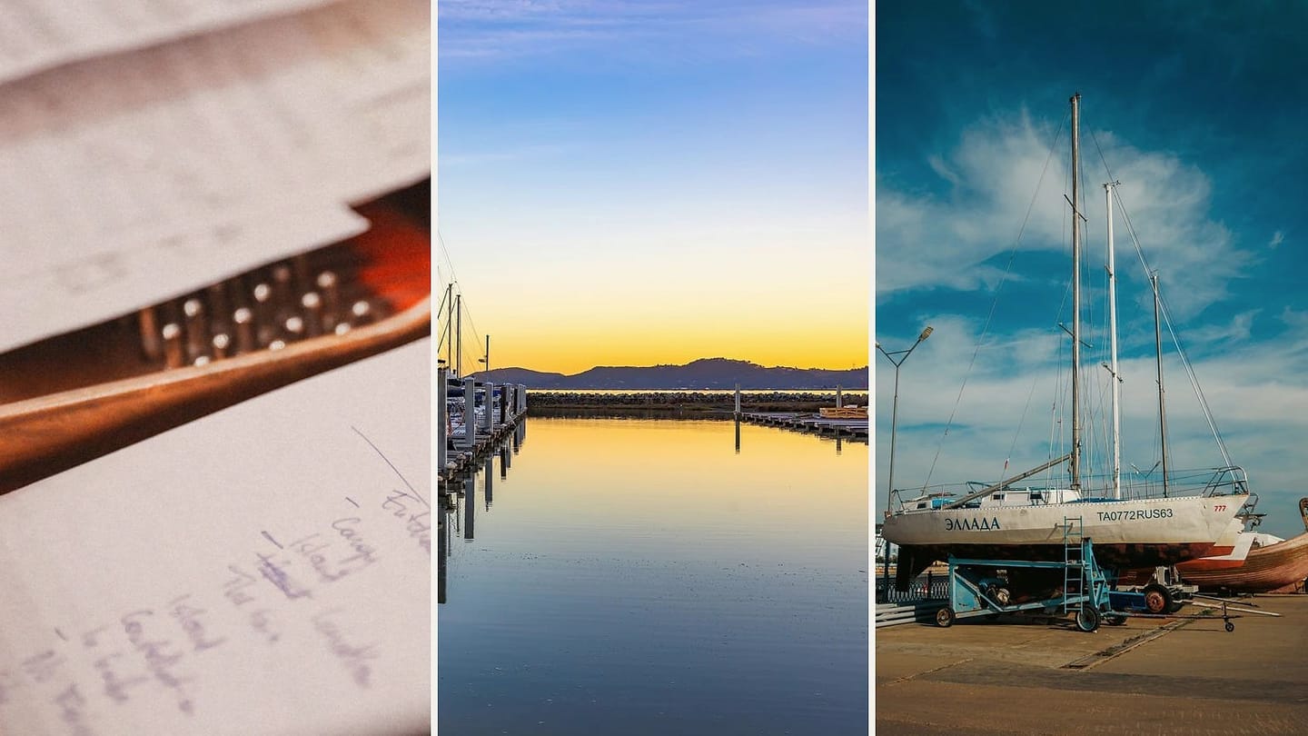 Handwritten checklist, wet marina slips, and a sailboat supported ashore