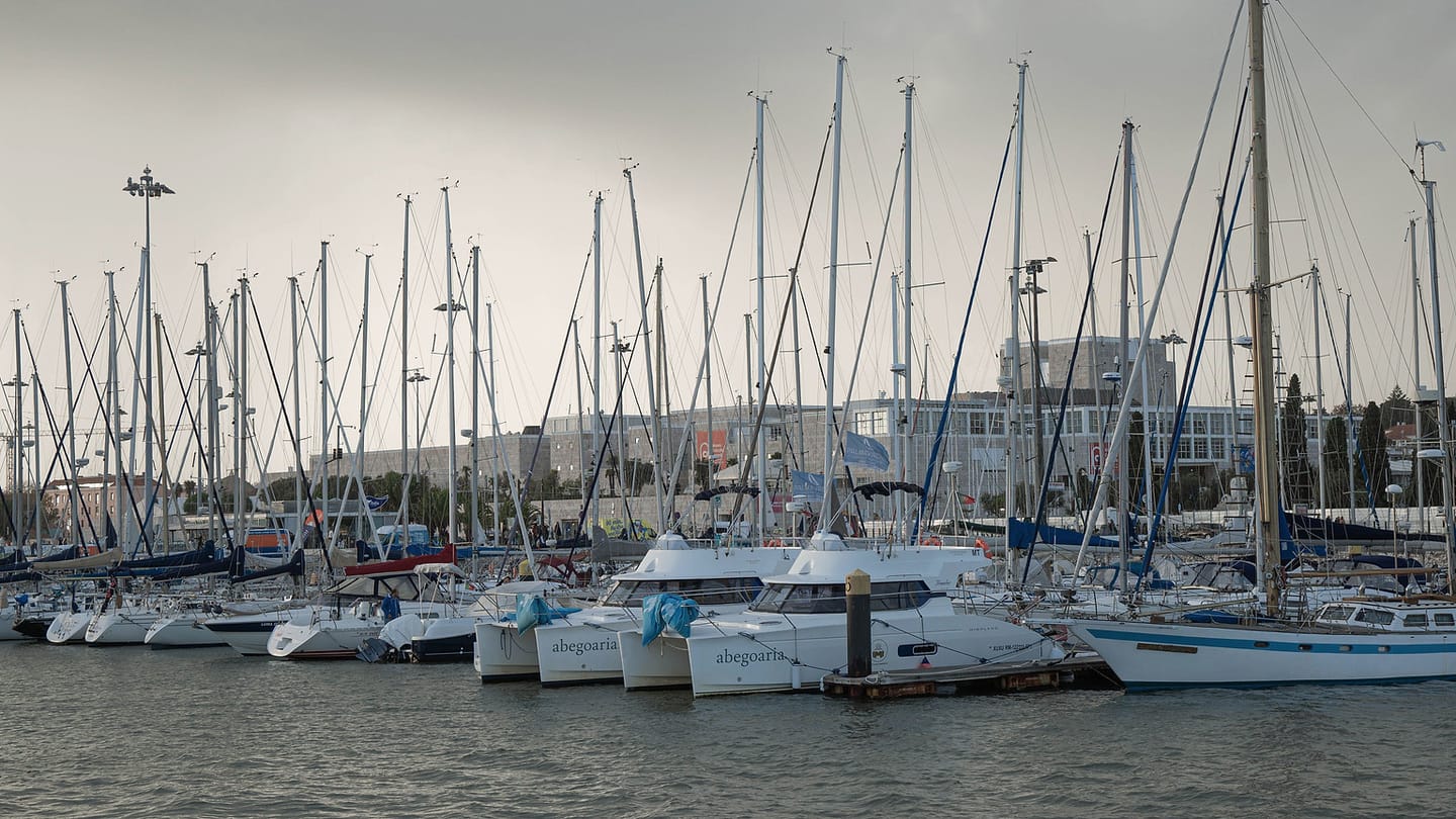 Rows of sailboats in a marina show the many lights and masts that can complicate a night departure.