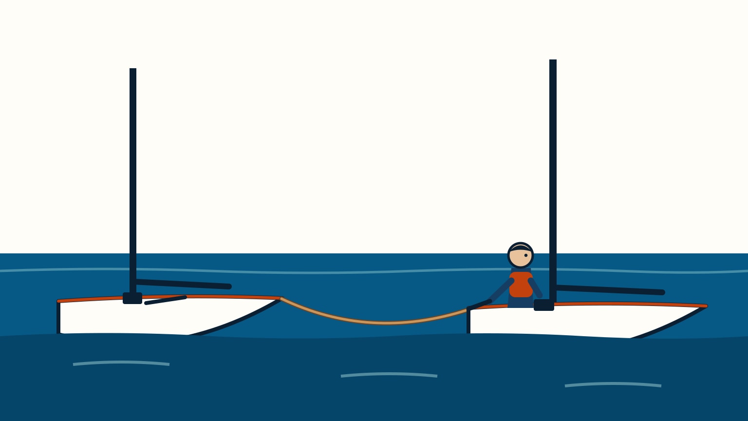 A sailboat under tow glides on a long line behind another boat in calm water, both boats riding the same gentle swell.