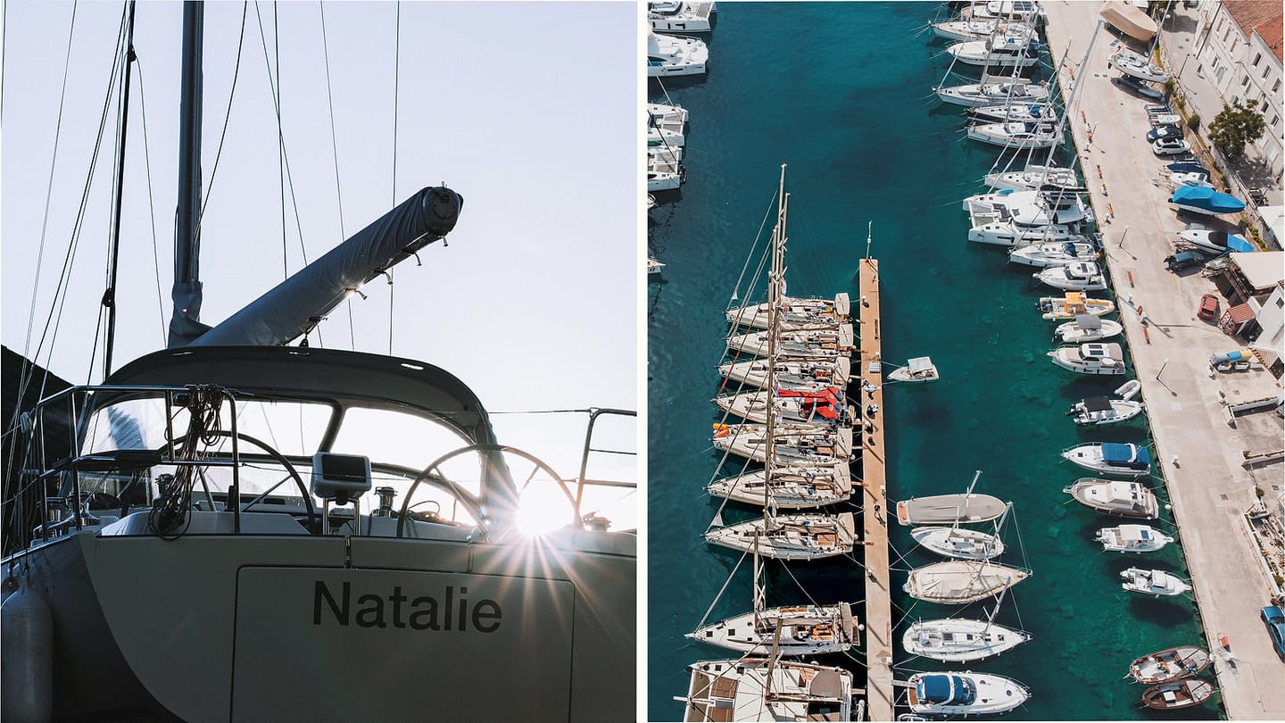 Sailboat and harbour viewed as navigation references