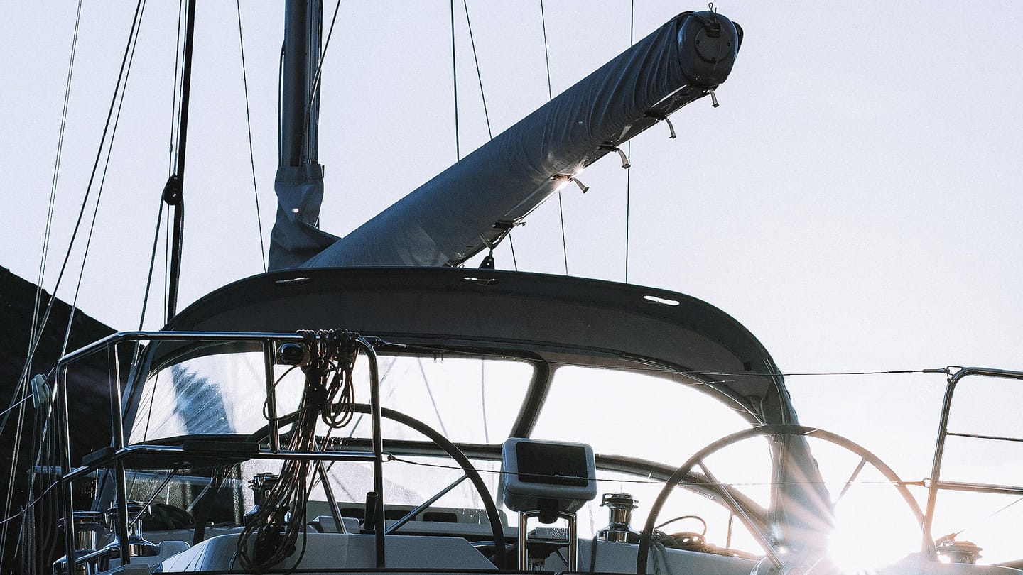 A sailboat tied alongside during a club visit